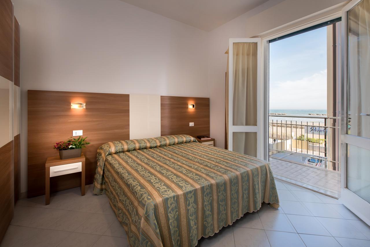 Hotel Vallechiara ลิโด ดิ ซาวิโอ ภายนอก รูปภาพ